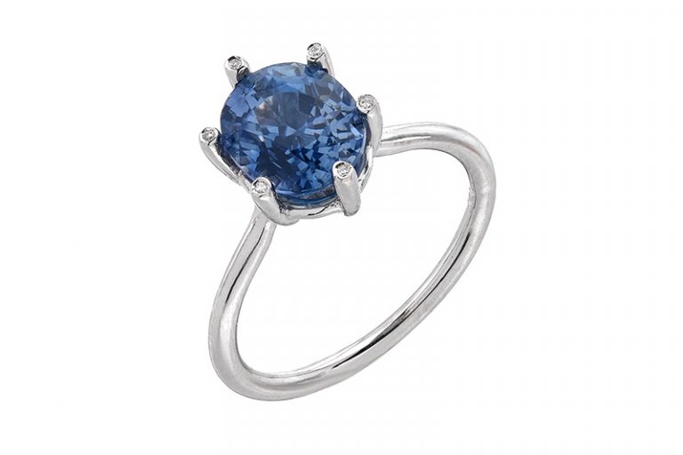 Sapphire ring sold in Liza Shtromberg's jewelry store in with heirloom diamonds for couples who scheduled a custom jewelry consultation